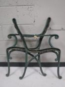 A pair of cast iron bench ends