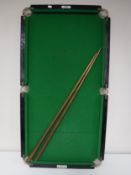 A Sykes miniature table top snooker table with accessories