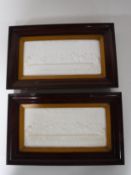 A pair of early twentieth century mahogany framed religious relief plaques