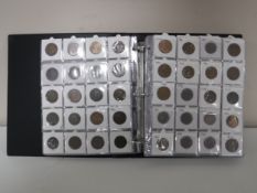 An album of approximately 400 late 19th and early 20th century British copper coins including