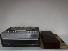 A cased Philips stereo track reel to reel together with a Decca 78 folio prelude to Pearl Harbour