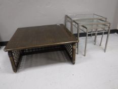 An Oriental style low coffee table on bamboo legs,