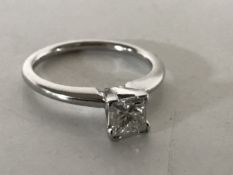 A white gold square cut diamond solitaire ring, size J, approximately 0.5ct.