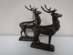A pair of cast metal figures - stags
