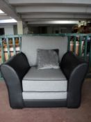 A contemporary two-tone armchair