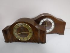 Two early 20th century walnut mantel clocks.