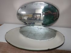 Two early 20th century un-framed mirrors
