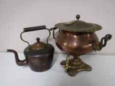 A copper and brass samovar and an antique copper kettle