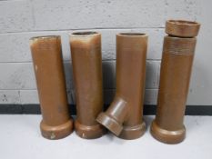 Five pieces of antique glazed pottery ground pipes