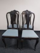 A set of four oak Queen Anne style chairs
