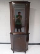 A mahogany Stag minstrel corner cabinet