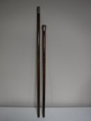 Two military swagger sticks