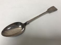 An antique EPNS serving spoon