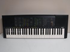 A Yamaha PSR-70 electric keyboard - no lead