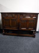 A Priory oak sideboard