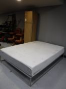 A boxed Ergoflex super king size memory foam mattress,