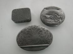 Three antique pewter snuff boxes