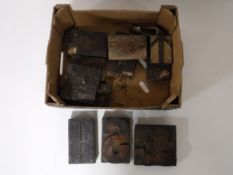 A box containing wooden printers blocks