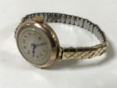 A vintage lady's 9ct gold cocktail watch on expanding bracelet