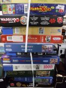 Twelve boxed jigsaws