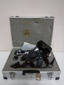 A Zenit - ES camera and an aluminium case containing camera equipment