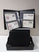 A box of albums of first day covers including WWF,