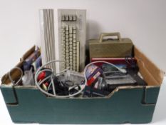 A Commodore 64 with accessories and games