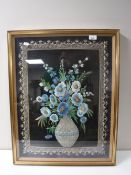 A Victorian stumpwork picture depicting flowers in a vase
