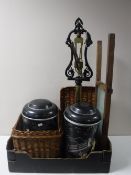 Two boxes containing washboard, wicker basket, large metal tea jars, plated ware, cutlery,