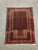 A Persian prayer rug