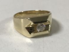 An 18ct gold solitaire diamond ring, approximately 0.6ct, size R.