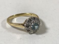A 18ct gold blue topaz cluster ring,
