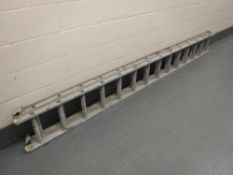 An aluminium extension ladder