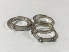 18ct white gold puzzle ring 9 diamonds 8.