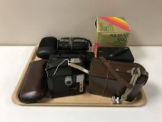 A tray of assorted cameras to include Bell and Howell cine camera, Kodak Instamatic,