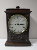 A mid-19th century rosewood and mother of pearl inlaid striking bracket clock,
