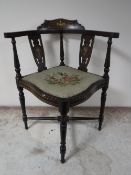 A Victorian inlaid mahogany corner chair