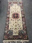 A Morrocan hand-made runner 214 cm x 90 cm