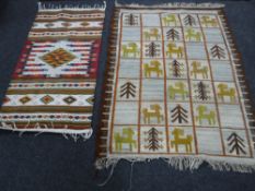 Two Eastern style rugs