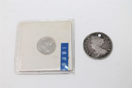 A Queen Anne Shilling 1711, pierced at 12 o' clock. Together with a Victorian three pence 1886.