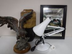 An eagle figure on wooden base, angel poised lamp,