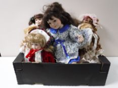 A box of a quantity of porcelain headed collector's dolls together with a Leonardo collection