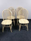 A set of four pine kitchen chairs