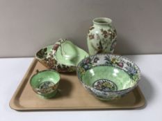 A tray containing four pieces of Maling lustre china