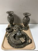 A tray of seven polished stone ornaments including table lighter, pair of vases,