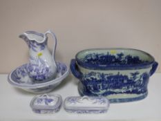A four piece Rose and Lily pattern china wash set together with a blue and white foot bath
