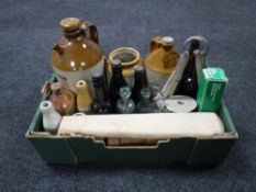 A box of vintage glass bottles, stoneware flagon's,