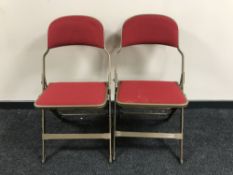 Approximately one hundred metal Sandler inter locking folding chairs