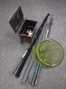 A quantity of fishing equipment includes fly feeder, boat and beach caster rods, landing net,