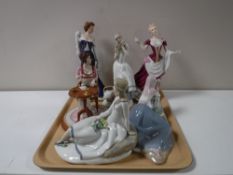 A tray of three Spanish figures,